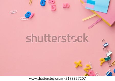 School supplies accessories stationery on pink background, flat lay, top view. Education stuff supplies accessories discount sales. Back to school, get ready for learning. Flatlay above. Copy space