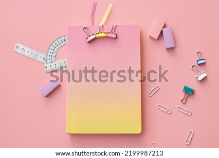 School supplies accessories stationery and notebooks on pink background, flat lay, top view. Stationary education supplies accessories discount sales. Back to school, get ready for learning. Flatlay.
