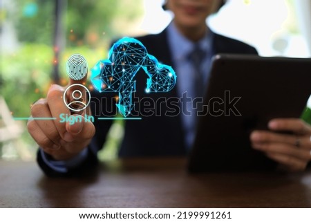 Businessman sign in with finger print scannig to access the cloud data.