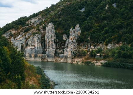 Unique natural place in Bulgaria Chudnite skali. Beautiful rocks near the reservoir. Unknown Bulgaria. A magical place created by nature Royalty-Free Stock Photo #2200034261
