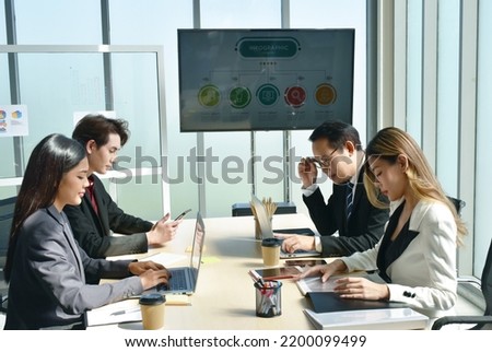Asian business man and woman meeting and disussing work in office room 