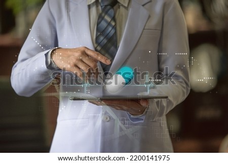 Woman doctor holding smart device with holographic medication
