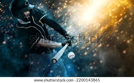Professional baseball player with bat taking a swing on grand arena. Ballplayer on stadium in action. Sports betting. Bets in the mobile application. Royalty-Free Stock Photo #2200143865