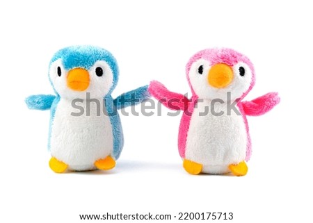 penguins toys on a white background