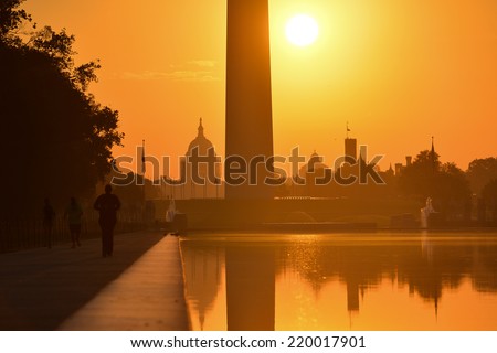 Washington D.C. - Sunrise at Lincoln Memorial with silhouettes of Capitol Building and Washington Monument