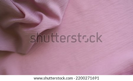 Pink Color Cloth Pattern Background,Silk Wave Texture Design Backdrop,Card Poster or Banner,Light Gradient Fabric Smooth Shape Colorful,Abstract Luxury Sweet Template Wallpaper,free space top view.