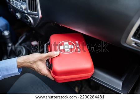First Aid Kit In Car Glove Box Royalty-Free Stock Photo #2200284481