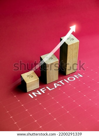 Shining rise up arrow increase on wooden cube blocks, bar graph chart steps with percentage sign and word INFLATION on red background, vertical style. Inflation and financial crisis business concepts.