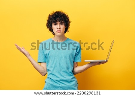 student laptop online chat communication yellow background