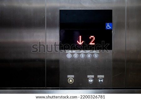 ฺButton of elevator for blind or disability people. (disabled lift)