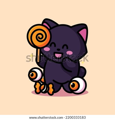 cute cat holding candy and celebrating halloween