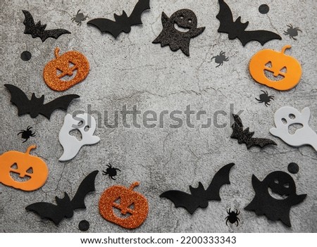 Halloween holiday background with  decorations. View from above. Flat lay