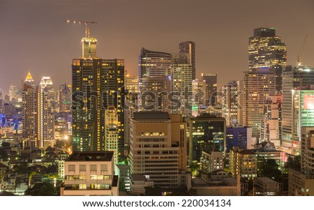 View of Bangkok skyline in the night. This picture was taken at the commercial center of Bangkok, Thailand.