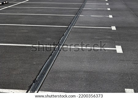 The parking space is marked with white lines on the road.