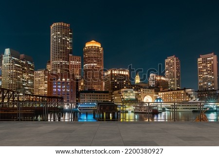 Skyscrapers Cityscape Downtown, Boston Skyline Buildings. Beautiful Real Estate. Night time. Empty rooftop View. Success concept.