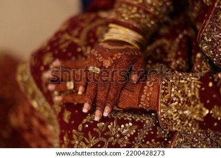 Indian  Pakistani Desi bride Henna hands at her wedding day
