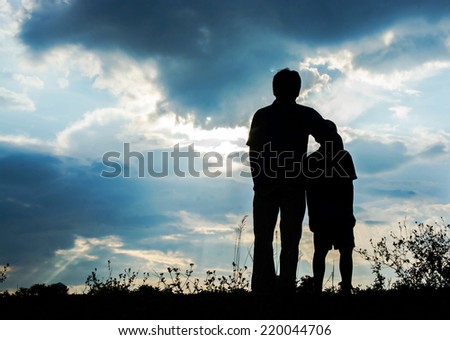 Father and son looking for future,  silhouette concept
