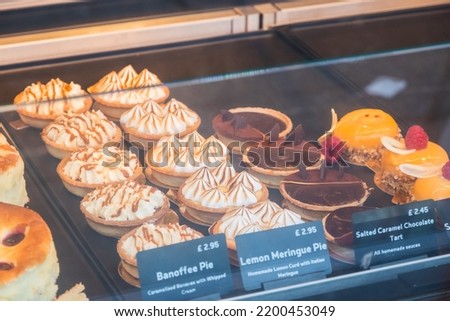 A variety of desserts displayed at a local bakery in Muswell Hill in London, England