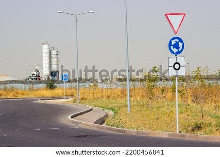 traffic direction sign white circle arrow on blue background