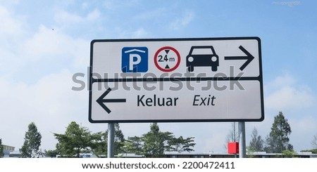 Road signs, Road signs show directions for exiting and directions for parking cars