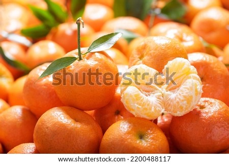 fresh mandarin oranges fruit or tangerines as background, top view Royalty-Free Stock Photo #2200488117