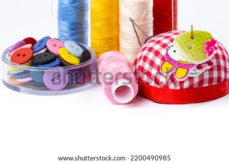 Sewing supplies, needles and thread, concept of a banner with goods for needlework and creativity, copy space, copy space.