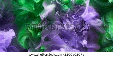 Green purple smoke abstract background, acrylic paint underwater explosion Royalty-Free Stock Photo #2200502095