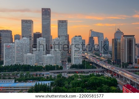 Beijing, China overlooking the central business district skyline at sunset.