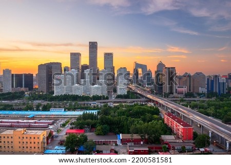 Beijing, China overlooking the central business district skyline at sunset.