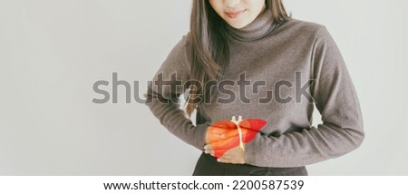 woman with liver pain, hepatitis vaccination, liver cancer treatment, world hepatitis day Royalty-Free Stock Photo #2200587539
