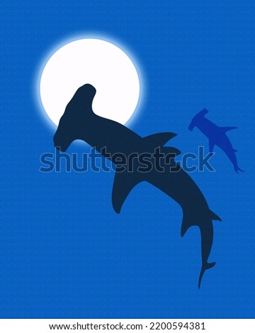 Hammer head Shark Swimming in the deep blue sea