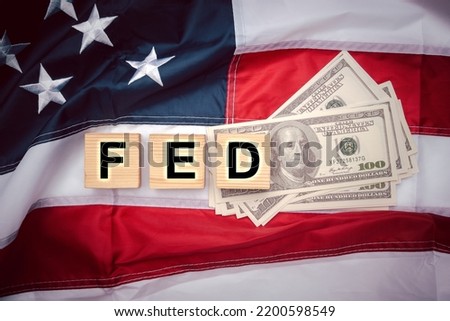 The FED, or Federal Reserve, is the main body that oversees the monetary policy of the United States. Interest rates affect the ability of consumers or businesses to access credit. Royalty-Free Stock Photo #2200598549