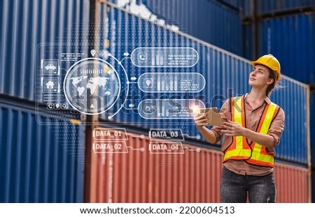 Professional engineer container cargo woman in helmets working standing and using technology tablet checking stock into container for loading.logistic transport and business industry export