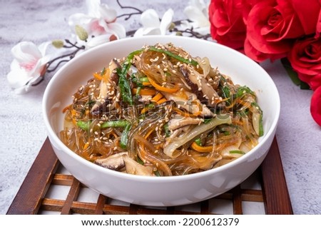 Delicious Korean food stir-fried vegetables (japchae) Royalty-Free Stock Photo #2200612379