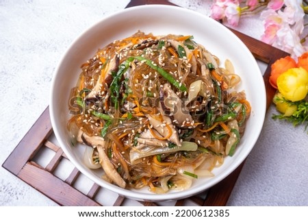 Delicious Korean food stir-fried vegetables (japchae) Royalty-Free Stock Photo #2200612385