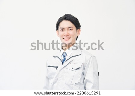 Portrait of Asian worker in white background