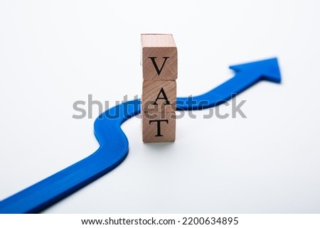 Arrow Going Around Word VAT In Tax Evasion Concept Royalty-Free Stock Photo #2200634895