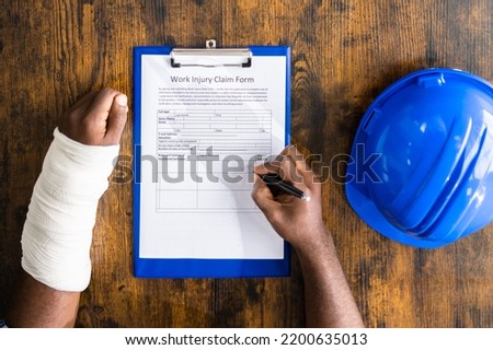 Worker Accident Insurance Disability Compensation And Social Benefits Royalty-Free Stock Photo #2200635013