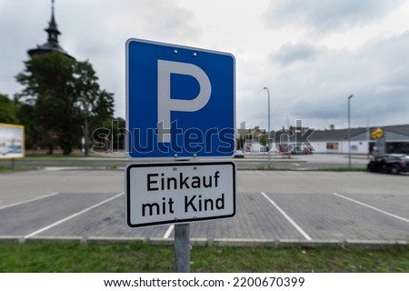 Traffic sign , parking for parents shopping with their children 