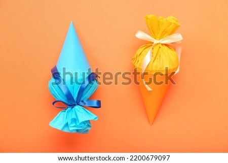 School cones on orange background