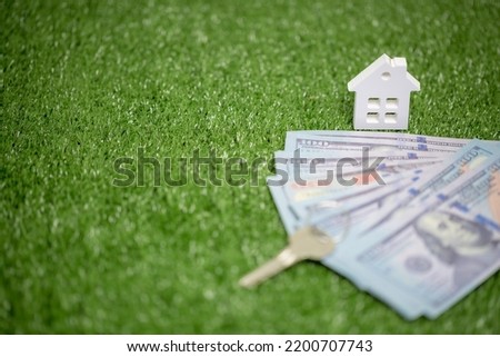 house property mortgage with cash money dollar bill on table concept of business finance, saving for buy home, investment loan, american currency, sale estate, bank payment, sell-rent real estate