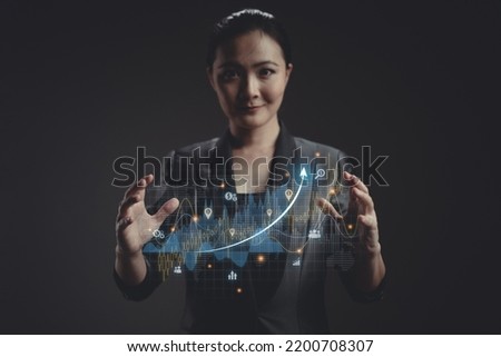Asian woman showing a growing virtual hologram of statistics chart, Business strategy and digital marketing. 