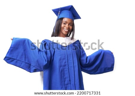 An African-American woman in a blue robe and hat on a white isolated background smiles and spreads her hands. Layout for your educational product. High quality photo