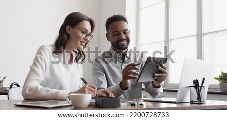 Business people working together in office and planning new project. Meeting and discussing strategy, brainstorming, startup, employee engagement, teamwork, business casual, partnership concepts Royalty-Free Stock Photo #2200728733
