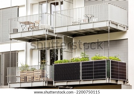 Solar panels on Balcony of  Building. Modern Balcony Apartment with Solar panel. Royalty-Free Stock Photo #2200750115
