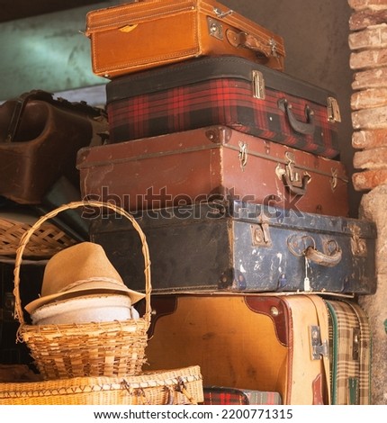 Vintage classic obsolete trunks luggage with tags, vintage antique leather suitcases. travel luggage concept. retro style filtered photo