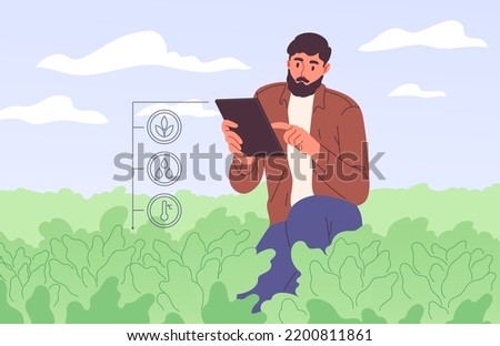 Ffarmer with tablet in field using specialized app Royalty-Free Stock Photo #2200811861