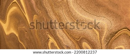 Abstract fluid art background dark golden and copper colors. Liquid marble. Acrylic painting on canvas with brown lines and gradient. Alcohol ink backdrop with glitter wavy pattern. Royalty-Free Stock Photo #2200812237