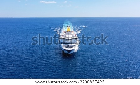 Aerial drone photo of passenger ferry reaching destination - busy port of Piraeus, Attica, Greece Royalty-Free Stock Photo #2200837493
