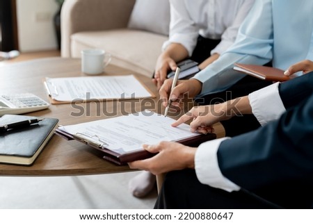 businessman reading documents at meeting, business partner considering contract terms before signing checking legal contract law conditions